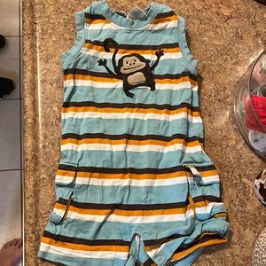 Baby body suit with a monkey on it